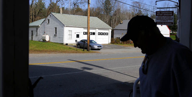LeeAnn and Archie Miller, owners of Fayette Country Store, submitted the successful proposal to purchase the town-owned former fire station across the street. A man exits the store on Tuesday.
