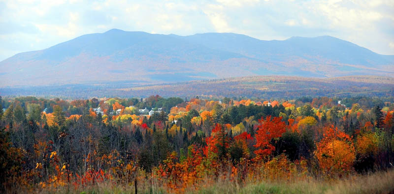 A patchwork of colors fill Carabassett Valley last week. Foliage has peaked in much of Maine, but there are still plenty of turning leaves for a worthwhile leaf-peeping road trip.