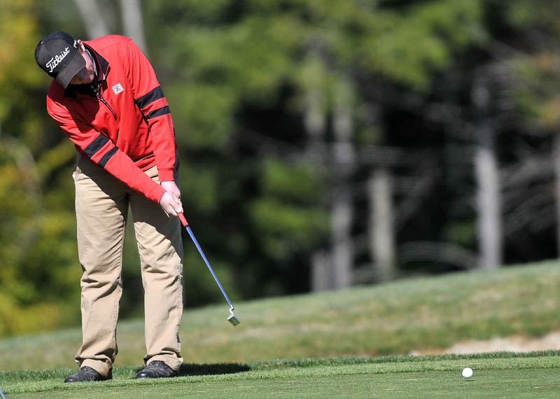 ON THE GREEN: Maine Central Institute’s Gavin Dugas putts on the 15th green during the individual golf state championships Saturday at Natanis Golf Course in Vassalboro. Dugas shot 80 to finish tied for sixth in Class B.