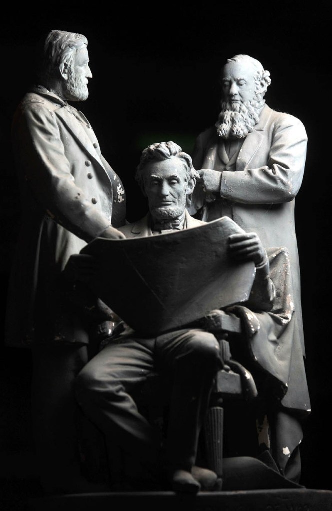 A plaster cast from 1868 shows a detailed scene of an 18-inch-tall President Abraham Lincoln holds a war council with Gen. Ulysses Grant and Secretary of War Edwin Stanton. It sold for $25 in 1868.