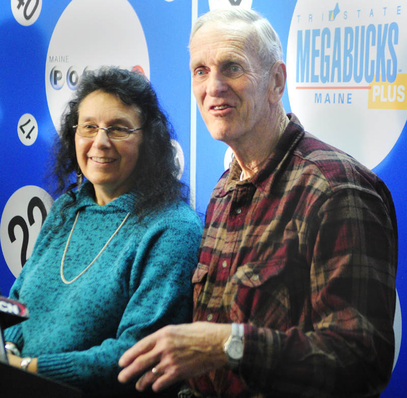 Lottery winner Linda Von Oesen, of Fairfield, left, and her husband Bob Von Oesen speak to reporters about winning the Tri-State Megabucks Plus during a news conference on Thursday morning in Hallowell.