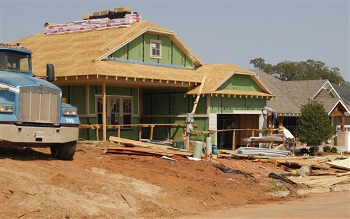 A new home is under construction recently in Edmond, Okla. The steady increase in prices, along with the lowest mortgage rates in decades, has helped many home markets slowly rebound nearly six years after the housing bubble burst.