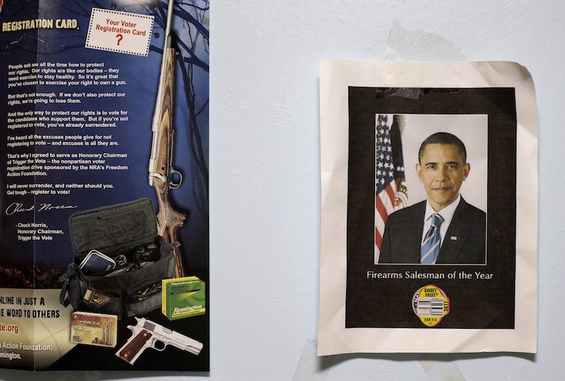 This photo taken Sept. 26, 2012 shows a picture of President Barack Obama labeled "Firearms Salesman of the Year" at the East Side Gun Shop in Nashville, Tenn. President Obama has presided over a heyday for the gun industry despite predictions by the National Rifle Association four years ago that he would be the "most anti-gun president in American history." Gun buyers fear that Obama wants to restrict their purchases, although his administration has never made any attempt do so. (AP Photo/Mark Humphrey)