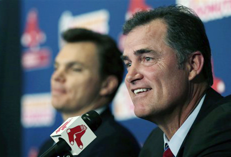 New Boston Red Sox manager John Farrell, right, smiles as he sits with general manager Ben Cherrington during a news conference at Fenway Park in Boston on Tuesday.