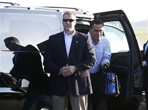 Republican presidential candidate Mitt Romney gets out of his vehicle before boarding his campaign plane at Weyers Cave-Shenandoah Valley Airport in Weyers Cave, Va., on Friday.