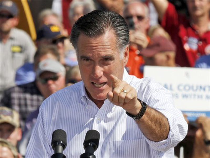 Republican presidential candidate, former Massachusetts Gov. Mitt Romney gestures during a rally in Abingdon, Va., Friday, Oct. 5, 2012. (AP Photo/Steve Helber)
