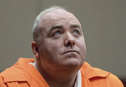 Michael Skakel listens to a statement from John Moxley, brother of victim Martha Moxley, in court in Middletown, Conn., in this Jan. 24, 2012, photo.