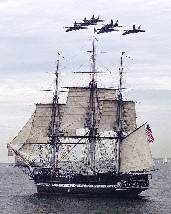 In this July 21, 1997, photo, the Blue Angels fly in formation over the USS Constitution as she free sails off the coast of Marblehead, Mass.