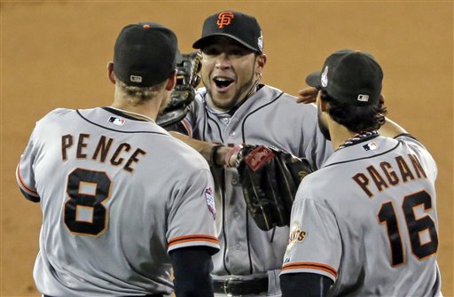 San Francisco Giants' Hunter Pence (8), Gregor Blanco and Angel Pagan (16) celebrate after San Francisco Giants beat Detroit Tigers 2-0 in Game 3 of baseball's World Series Saturday, Oct. 27, 2012, in Detroit. (AP Photo/Charlie Riedel) MLB