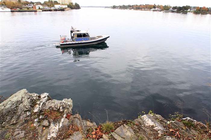 The New Hampshire Marine Patrol on Monday continues to search the Piscataqua River near a cliff on Pierce Island in Portsmouth, N.H., for the body Elizabeth "Lizzy" Marriott.