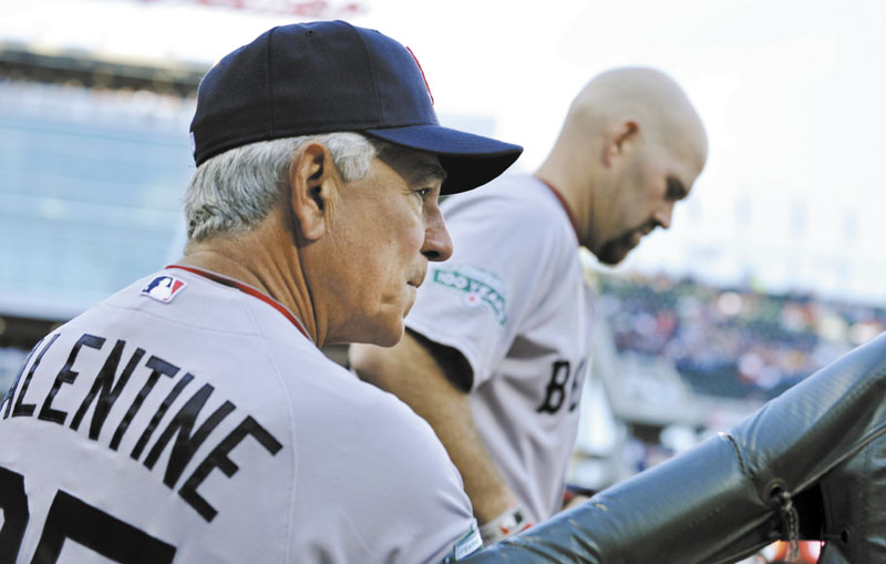 NO LONGER HERE: Bobby Valentine, left, was fired Thursday after leading the Red Sox to a 59-93 record in his first season with the team. Valentine questioned former Red Sox third baseman Kevin Youkilis’s desire early in the season, before Youkilis was traded to the Chicago White Sox.