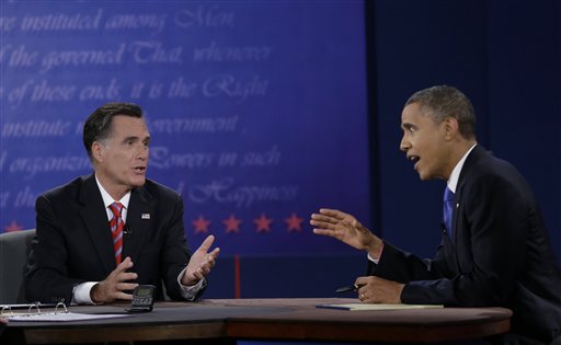President Barack Obama, right, and Republican presidential nominee Mitt Romney discuss a point during the third presidential debate at Lynn University, Monday, Oct. 22, 2012, in Boca Raton, Fla. (AP Photo/Eric Gay)
