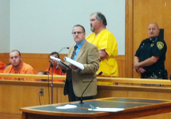 Donald A. Henson (in yellow) appears with attorney B.J. Broder, who represented Henson in Biddeford District Court on Wednesday.