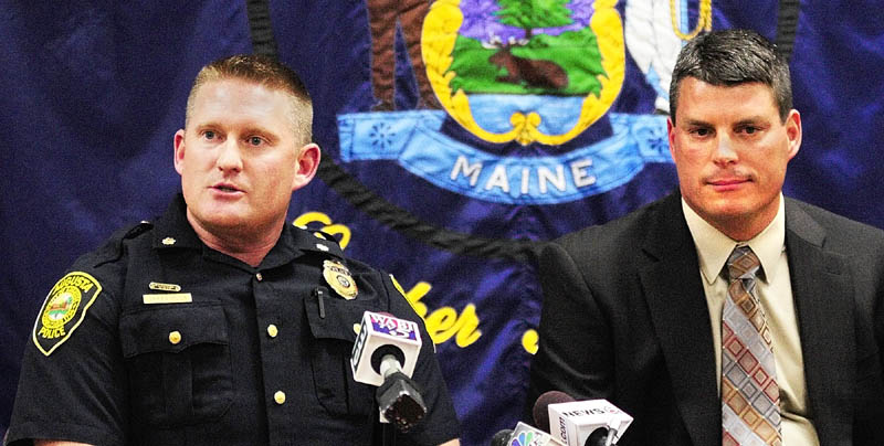 Augusta Deputy Police Chief Jared Mills, left, and State Police Lt Chris Coleman answer questions on Tuesday afternoon in Augusta about the arrest in Seattle of Gary Raub, 63, who allegedly stabbed a 70-year-old Augusta woman to death in 1976. Blanche Kimball was found dead in her 352 State St. home June 12, 1976, after neighbors called to say she hadn't been seen for several days.