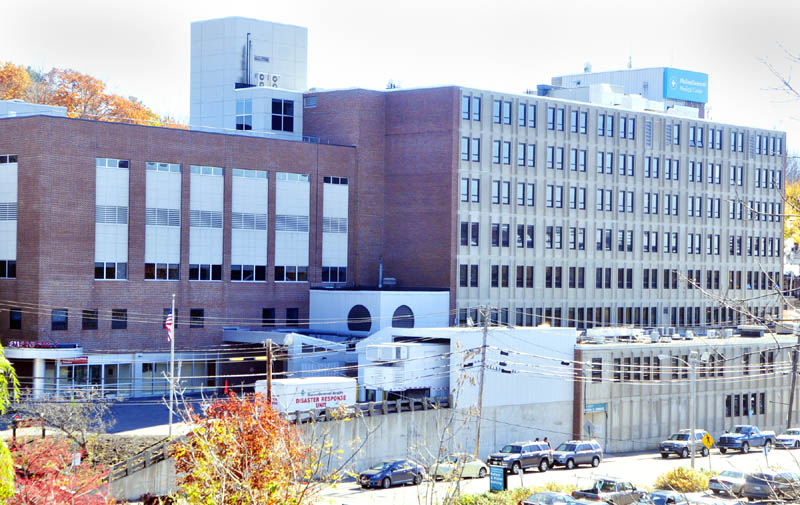 This photo taken from Memorial Bridge shows the MaineGeneral Medical Center hospital in Augusta. The property, along with MaineGeneral's Seton unit in Waterville, failed to attract the minimum $2.6 million bid in a three-day, online auction that ended Wednesday.