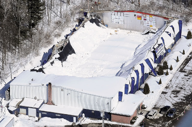 This aerial photo taken March 3, 2011, shows the collapsed roof of the Kennebec Ice Arena in Hallowell. No one was injured when the roof feel onto to the ice rink.