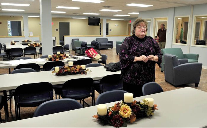 Mid-Maine Homeless Shelter Executive Director Betty Palmer gave a tour of the new shelter in Waterville in 2014. Palmer is speaking in the shelter’s multipurpose room.