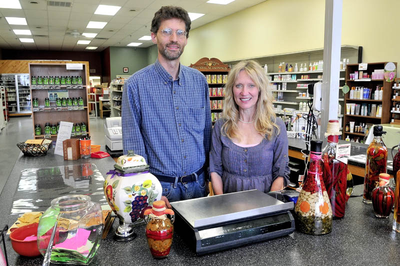 Bryce Boynton and JeanMarie Smith inside their Spice of Life natural foods store in Skowhegan.