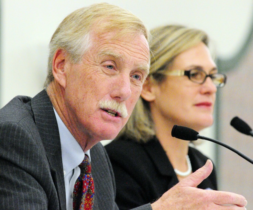 Staff photo by Joe Phelan United States Senate candidates Angus King, left, and Cynthia Dill participate in the Maine Municipal Association's debate on Thursday afternoon at the Augusta Civic Center.