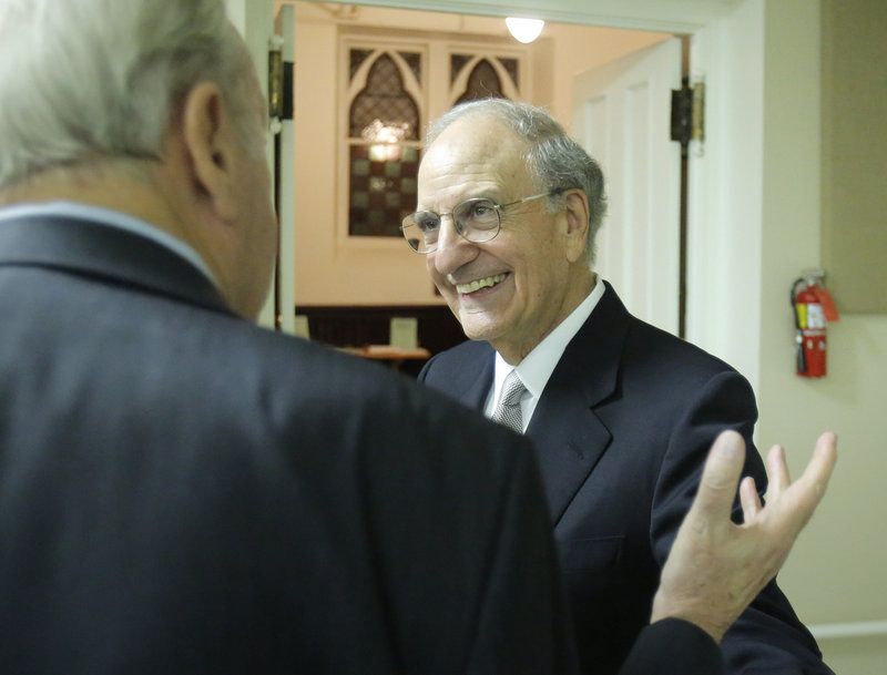 Sen. George Mitchell is greeted on arriving at the Maine Irish Heritage Center to accept the fifth annual Claddagh Award.