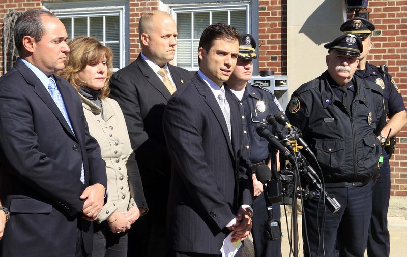 New Hampshire Assistant Attorney General James Vara, center, holds a news conference Saturday in Dover, N.H., where he announced that a University of New Hampshire student reported missing last week, Elizabeth “Lizzi” Marriott, was dead and a 29-year-old Dover man has been charged with second-degree murder in connection with her slaying.