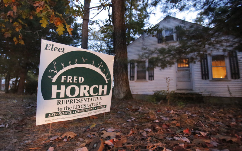 A yard sign supporting a Green Party candidate in front of Jonathan Crimmins' home. Crimmins is the chairman of the Brunswick Republican Town Committee, the Republican running for House District 66 calls the yard sign "a bit of a slap in the face."