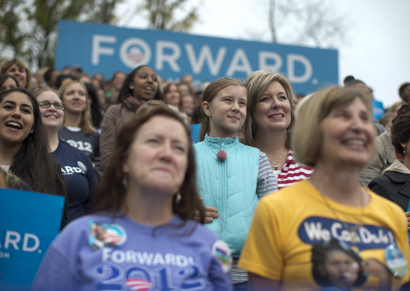 Supporters listen to President Obama speak about the choice facing women in the upcoming election on Friday at George Mason University in Fairfax, Va.