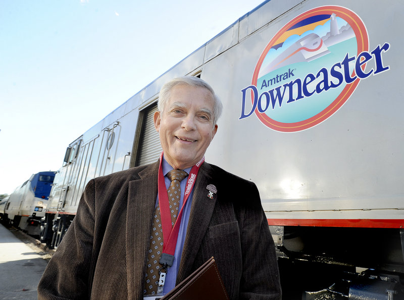 Wayne Davis stands in front of the Amtrak Downeaster at the Portland Transportation Center this month.