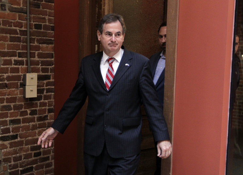 Indiana Senate candidate Richard Mourdock arrives for a news conference Wednesday in Indianapolis, where he discussed his rape and pregnancy comment in a debate Tuesday night. His words are being “twisted,” the Republican said.