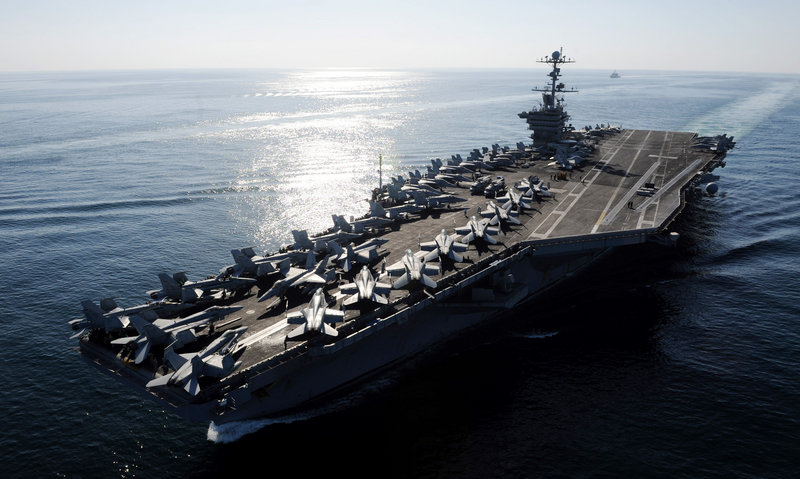 The Nimitz-class aircraft carrier USS John C. Stennis transits the Strait of Hormuz in 2011. The United States has 11 aircraft carriers while no other nation has more than two.