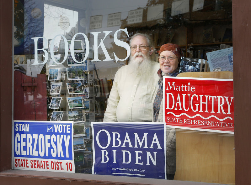 Gary Lawless and his wife, Beth Leonard, have been criticized for displaying a sign at Gulf of Maine Books in Brunswick backing a Democratic House candidate who Lawless calls “young, smart and really energetic” instead of the Green Independent candidate.