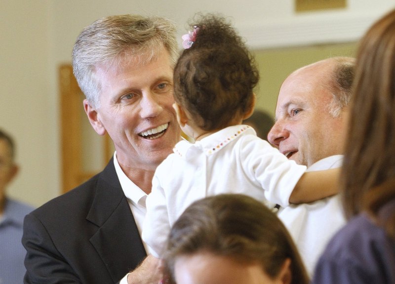 At his primary election night headquarters in South Portland in June, Republican nomination winner Charlie Summers greets Brooke Briggs of Biddeford and her father, Jason, after arriving at the reception.