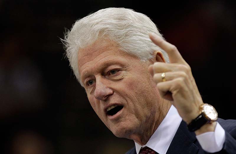 Former President Bill Clinton speaks at a "Hoosier Common Sense" rally for Democratic U.S. Senate candidate Joe Donnelly and Indiana gubernatorial Democratic candidate John Gregg in Indianapolis on Friday.