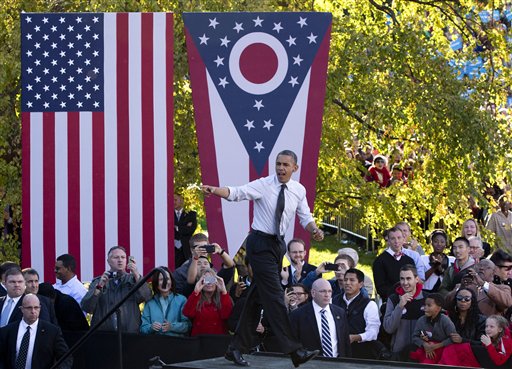 FILE - In this Oct. 9, 2012 file photo, President Barack Obama arrives to speak at The Ohio State University Oval, in Columbus, Ohio. Winning Ohio is complicated, with its variety of voter groups and swinging trends. Diverse in geography, economy and demographics, Ohio is a state that one political scientist says offers a fairly close mirror of the nation. History and electoral math say the swing state is pivotal again this year, and probably crucial for Mitt Romney to win. President Barack Obama is trying to repeat his 2008 victory. (AP Photo/Carolyn Kaster, File)