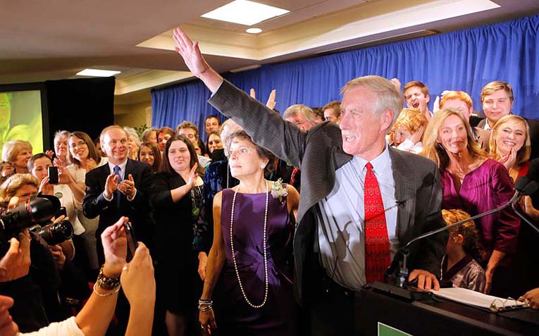 Angus King waves to supporters as he takes the stage in Freeport on Tuesday night after being declared the winner for the race for the U.S. Senate seat being vacated by Sen. Olympia Snowe.