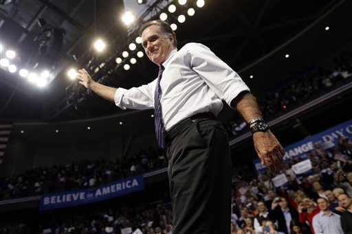 Republican presidential candidate and former Massachusetts Gov. Mitt Romney waves at the end of a New Hampshire campaign rally at Verizon Wireless Arena in Manchester, N.H., Monday, Nov. 5, 2012. (AP Photo/Charles Dharapak)