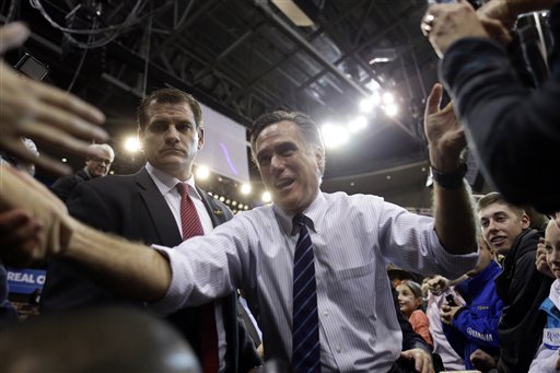 Republican presidential candidate and former Massachusetts Gov. Mitt Romney greets supporters at a New Hampshire campaign rally at Verizon Wireless Arena in Manchester, N.H., Monday, Nov. 5, 2012. (AP Photo/Charles Dharapak)