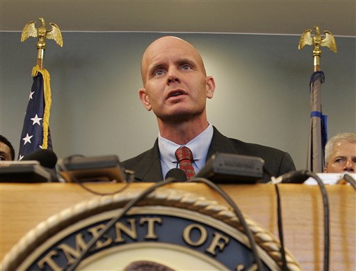 In this July 27, 2005 photo, FBI Agent Frederick Humphries speaks during a news conference after the sentencing of Ahmed Ressam at the Federal Courthouse in Seattle. Humphries has been identified as the agent socialite Jill Kelley contacted to complain about harassing emails sent by Gen. David Petraeus' paramour, Paula Broadwell. (AP Photo/Kevin P. Casey)