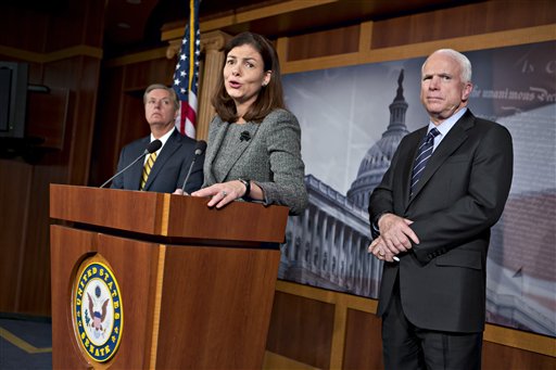 Sen. John McCain, R-Ariz., right, the ranking member of the Senate Armed Services Committee, right, joined by Sen. Lindsey Graham, R-S.C., far left, and Sen. Kelly Ayotte, R-N.H., center, says he would do all he could to block the nomination of United Nations Amb. Susan Rice to replace Secretary of State Hillary Rodham Clinton because of comments she made after the deadly Sept. 11 attack on the U.S. consulate in Benghazi, at a press conference at the Capitol in Washington, Wednesday, Nov. 14, 2012. President Barack Obama later responded in a news conference saying Rice's critics should "go after me" � not her � if they have issues with the administration's handling of the deadly attacks on Americans in Benghazi, Libya. (AP Photo/J. Scott Applewhite)