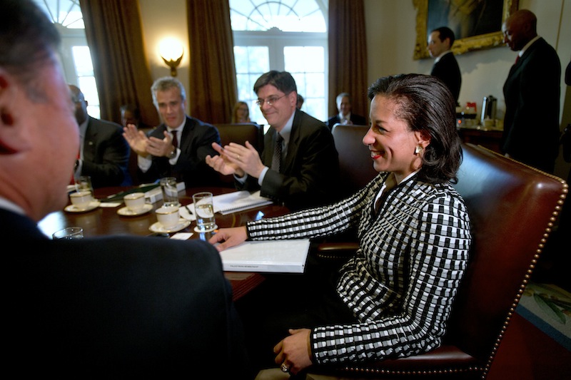 UN Ambassador Susan Rice, right, smiles as she is applauded, as President Barack Obama says what an excellent job she has been doing, before meeting with his cabinet, Wednesday, Nov. 28, 2012, in the Cabinet Room of the White House in Washington. Earlier, Rice continued her fight on Capitol Hill to win over skeptics in the Senate who could block her chances at becoming the next U.S. secretary of state. Republican lawmakers said they were even more troubled after face-to-face meetings with her over the handling of the Sept. 11 deadly attack on the U.S. Consulate in Benghazi, Libya. (AP Photo/Jacquelyn Martin)