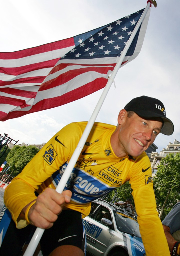 In this 2005 file photo, Lance Armstrong takes part in a victory parade on the Champs Elysees in Paris after winning his seventh straight Tour de France cycling race.
