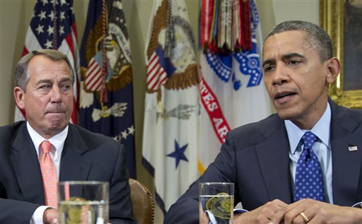 President Barack Obama, right, accompanied by House Speaker John Boehner, R-Ohio, speaks to reporters in the Roosevelt Room of the White House in Washington. The two leaders are trying to forge a compromise to avoid the "fiscal cliff" -- a combination of factors that threaten to invoke automatic tax increases and spending cuts on Jan. 1, which many claim would be ruinous to the nation's fragile economy.
