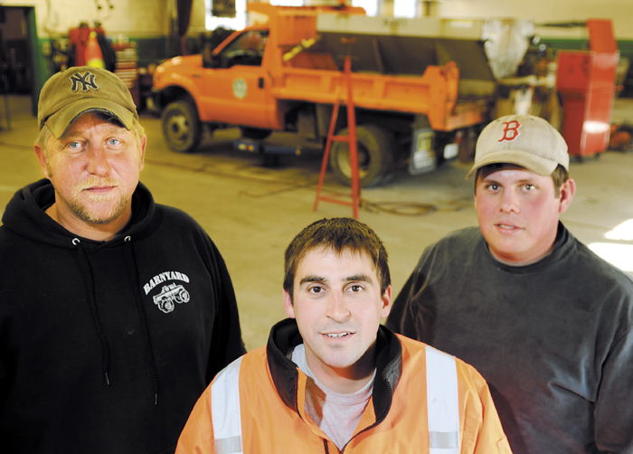 Augusta Public Works employee Nick Melanson, center, is receiving help from colleagues, including David Burlingame, left, and Ryan Theberge, after his son was born with a rare genetic disorder.