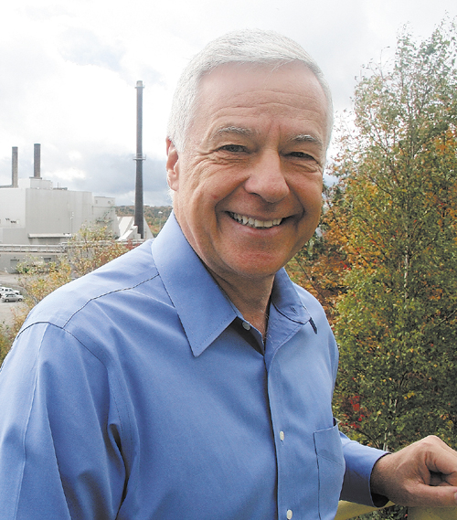 U.S. Representative Mike Michaud stands outside Great Northern Paper mill in East Millinocket.