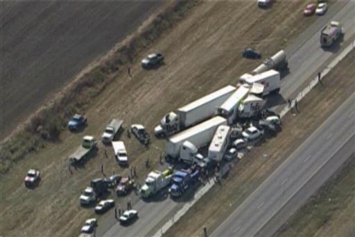 In this image provided by Click2houston.com cars and trucks are piled on Interstate 10 in southeast Texas on Thursday.