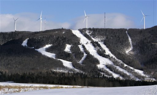 Wind turbines stand atop Mars Hills Mountain in Mars Hill in this Jan. 17, 2007 file photo. Wind farm tax breaks could be cut soon, even if Congress manages to avoid the federal fiscal cliff looming at the end of December.