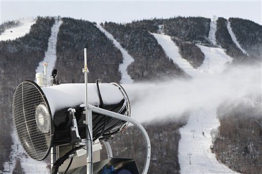 A snow gun makes fresh snow at the Stowe resort in Stowe, Vt., last Thursday. The ground might be bare, but ski areas across the Northeast are making big investments in high-efficiency snowmaking so they can open more terrain earlier and longer.