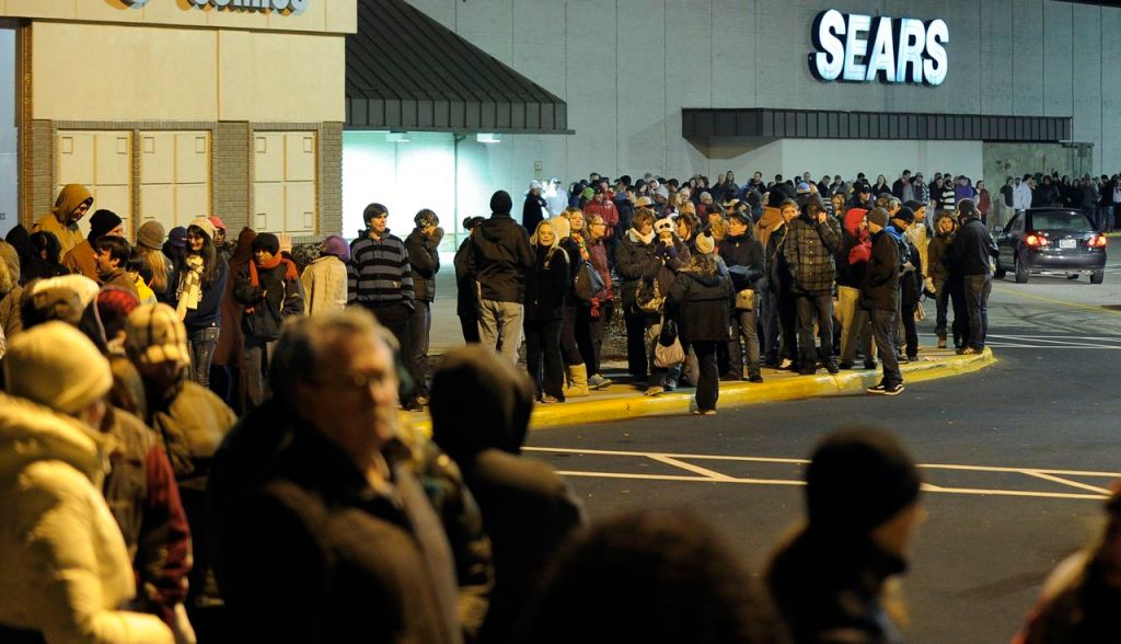 Shoppers waited in line to get into Best Buy at the Maine Mall in South Portland when it opened at midnight for Black Friday.
