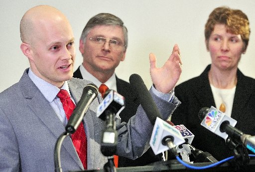 Maine Democratic Party Chair Ben Grant, left, appears at a news conference in the State House's Welcome Center earlier this year. 2012 file photo