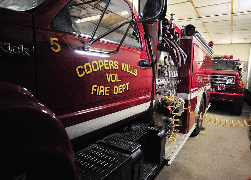 Engine 5 and Tank 1 share a bay door at the Coopers Mills fire station in Whitefield. Coopers Mills Volunteer Fire Department Association Chief Tim Yorks said that sometimes they have to shuffle trucks if there is a mutual aid request for a tank truck from another town.